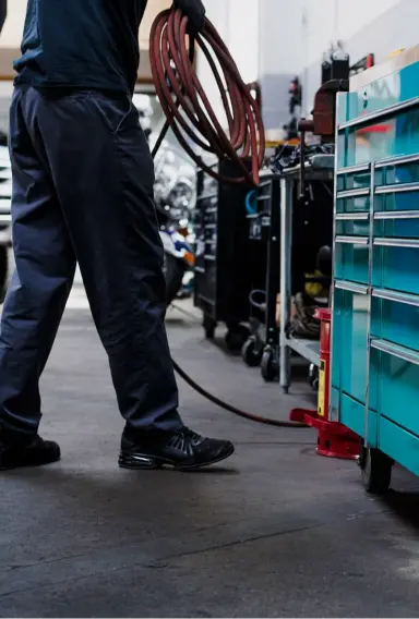 Mechanic in Garage
